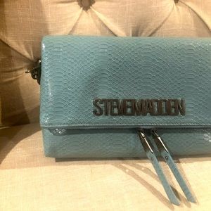 Brand new purse with crossbody or chain for a dressier look.